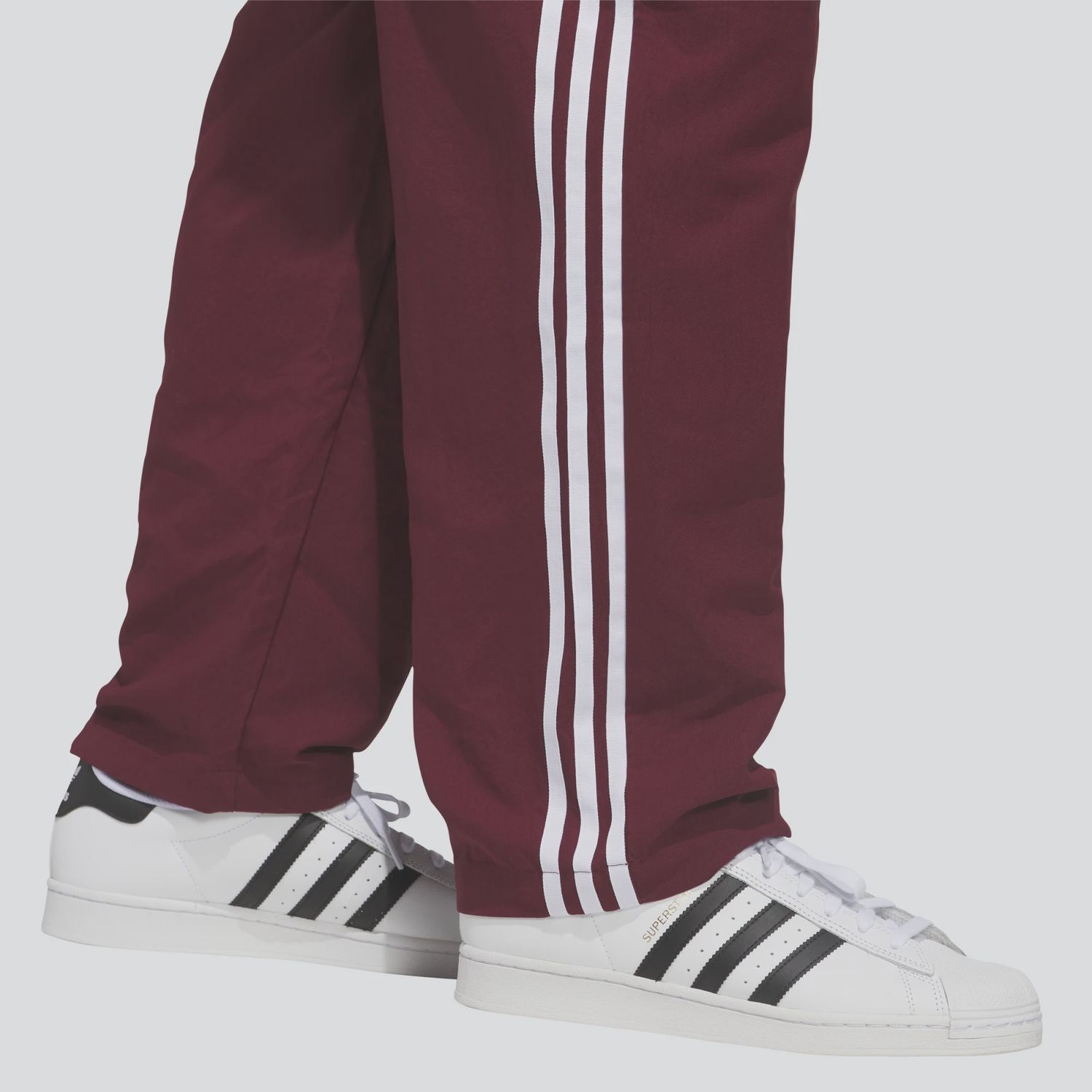 ADIDAS UNISEX SUPERFIRE TRACK PANT - SHADOW RED/WHITE
