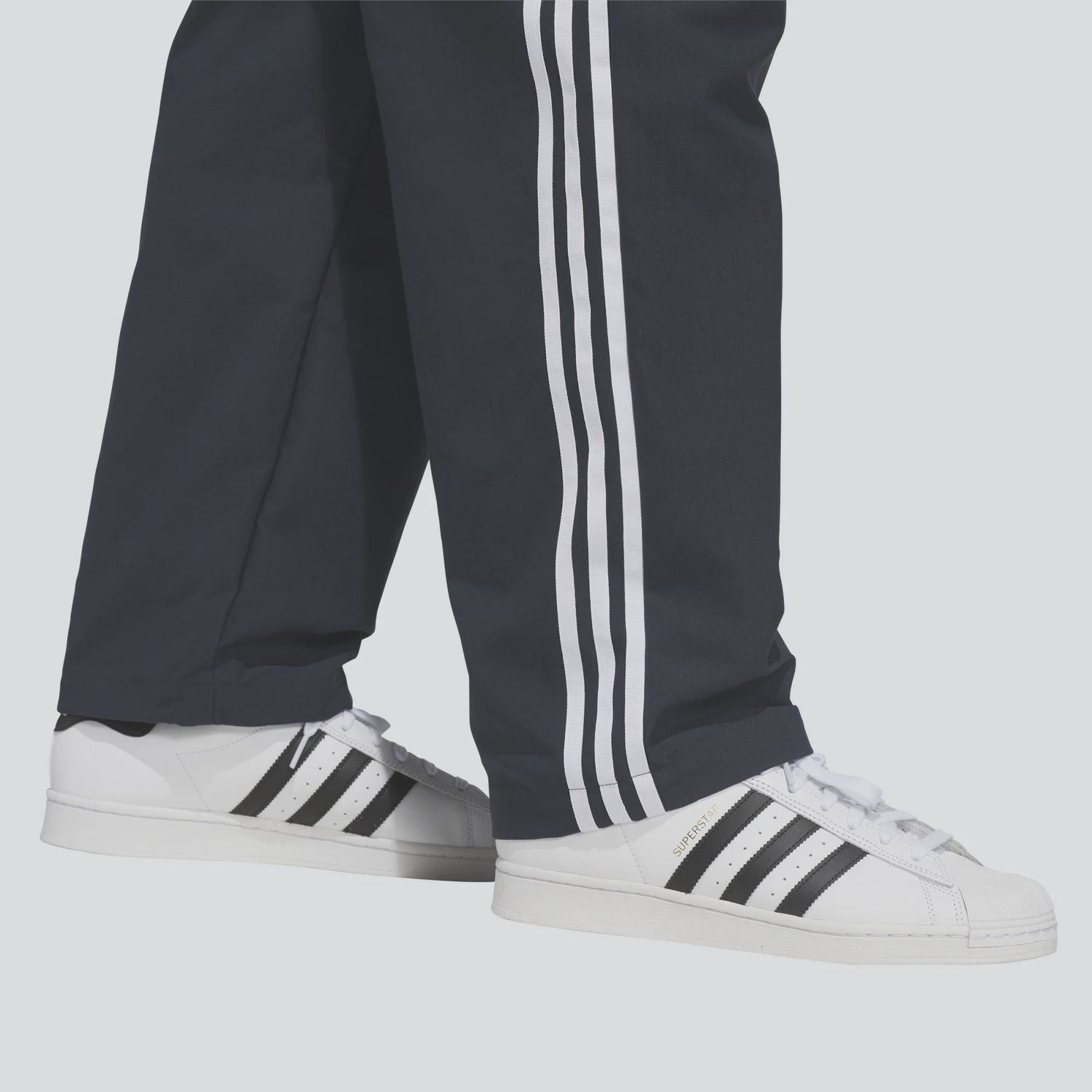 ADIDAS UNISEX SUPERFIRE TRACK PANT - AURORA INK/WHITE
