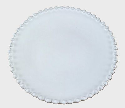 Wit klein bordje met rand van witte bolletjes