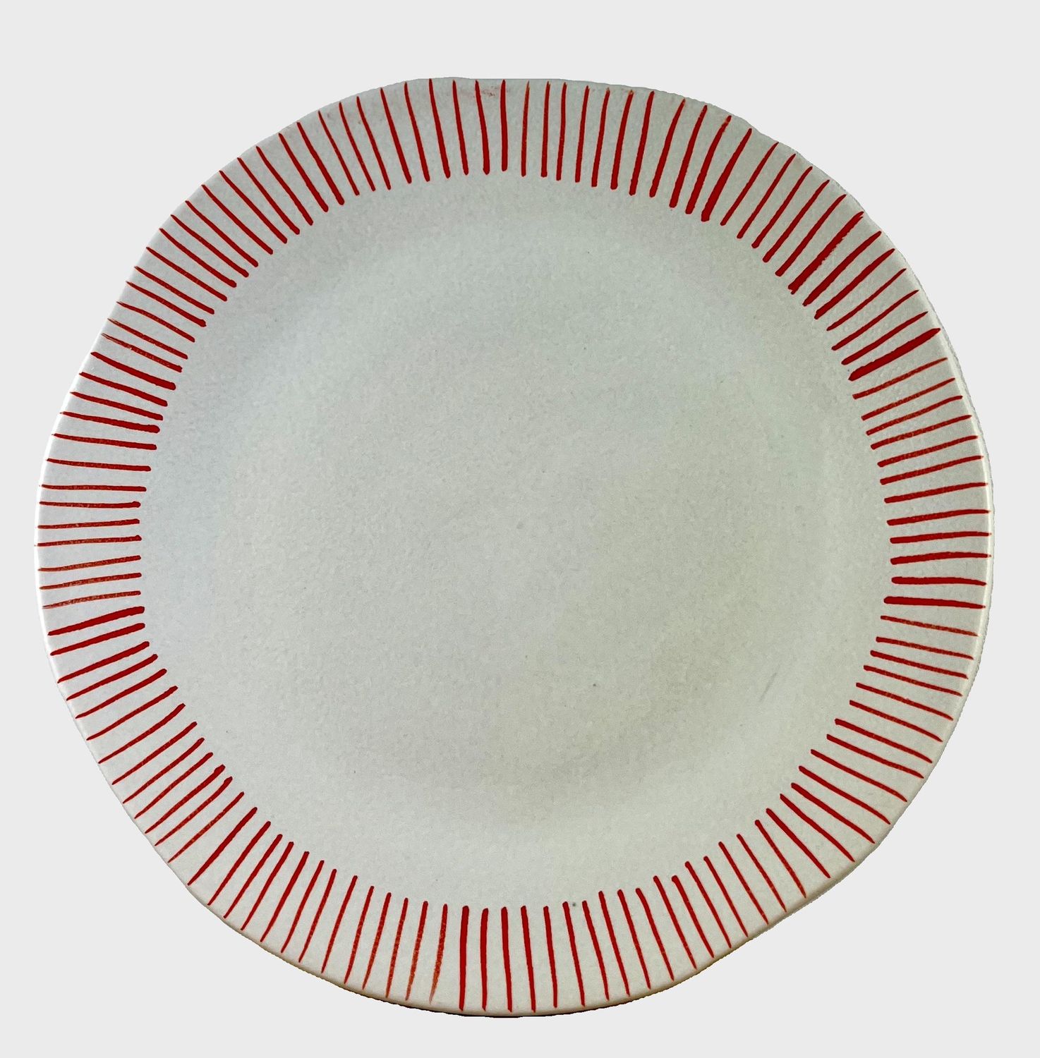 Wit dinerbord met oranje details