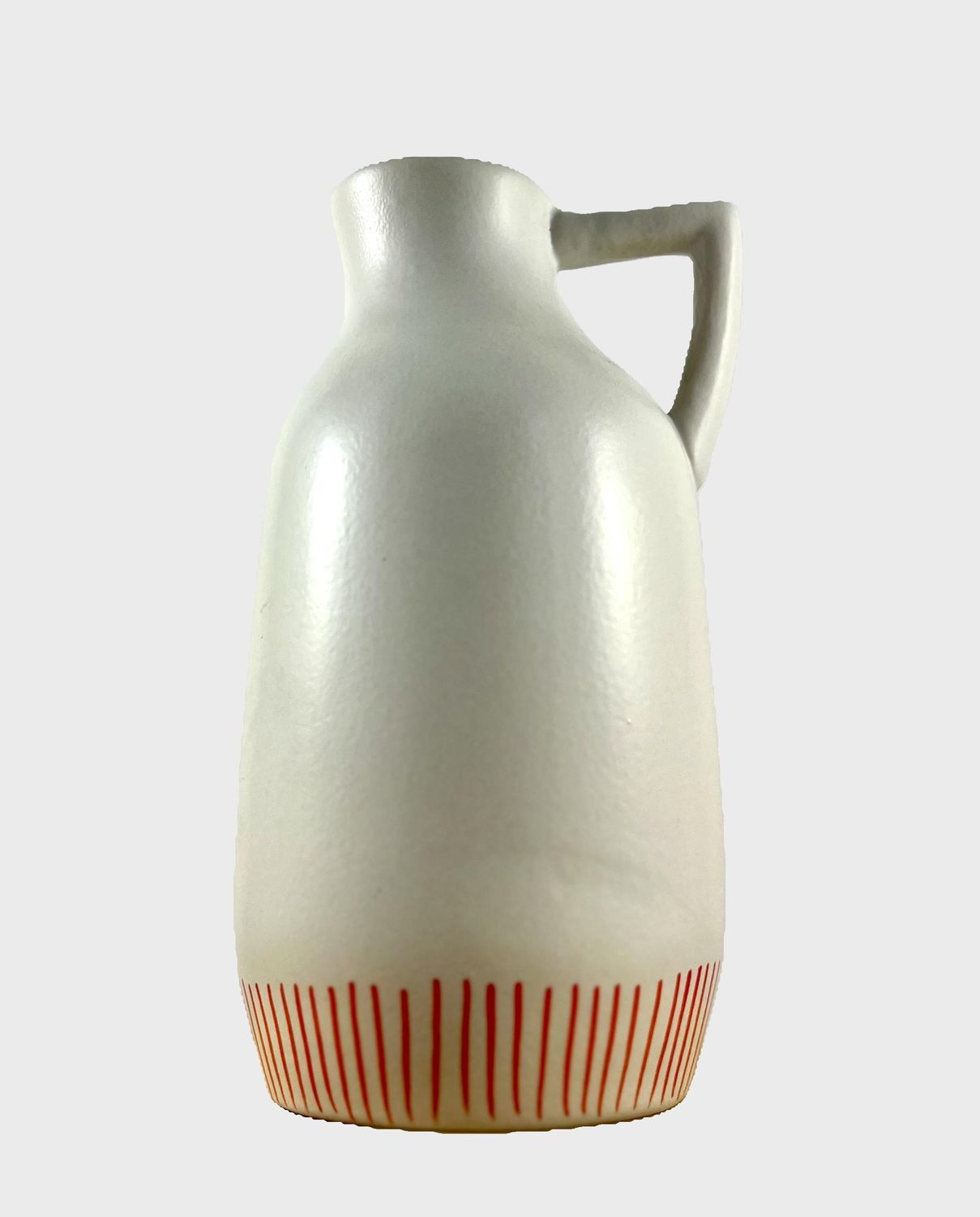Witte karaf met oranje details
