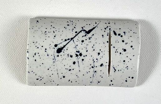 Witte besteklegger met blauwe splash van Enry Hands