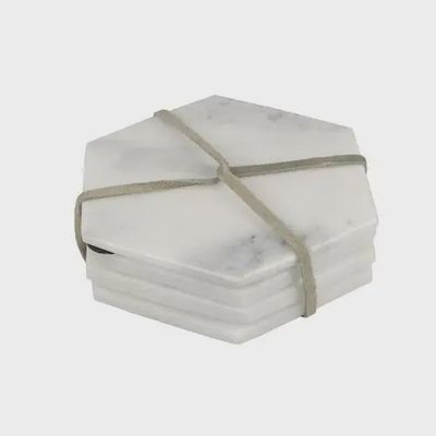 Set van vier witte hexagon onderzetters