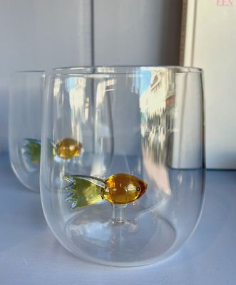 Waterglas met klein visje