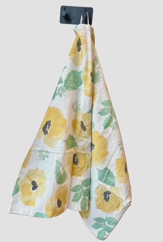 katoenen theedoek Sagaform met gele bloemen en ophanglus voor keuken