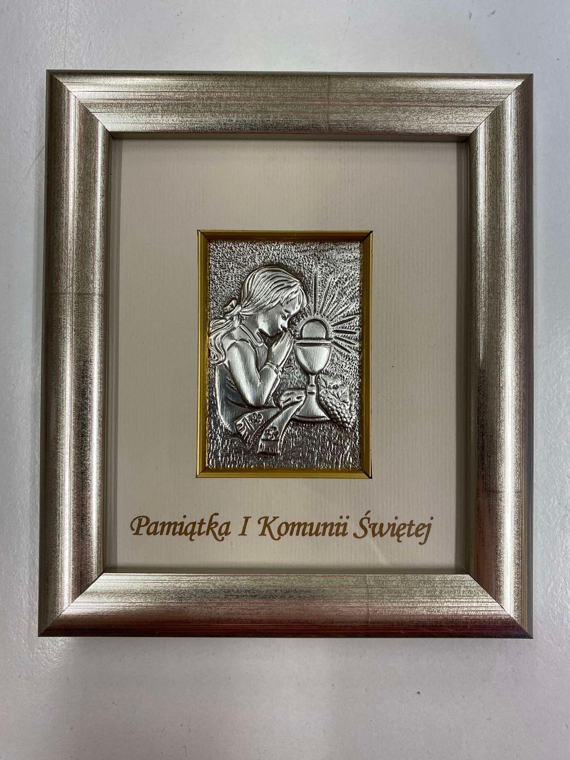 Pamiątka I Komunii Świętej dziewczynka