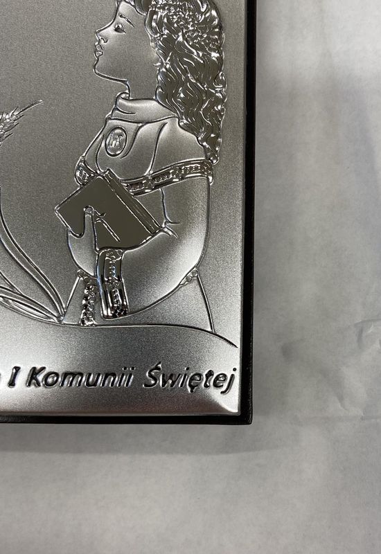 Pamiątka I Komunii Świętej dziewczynka