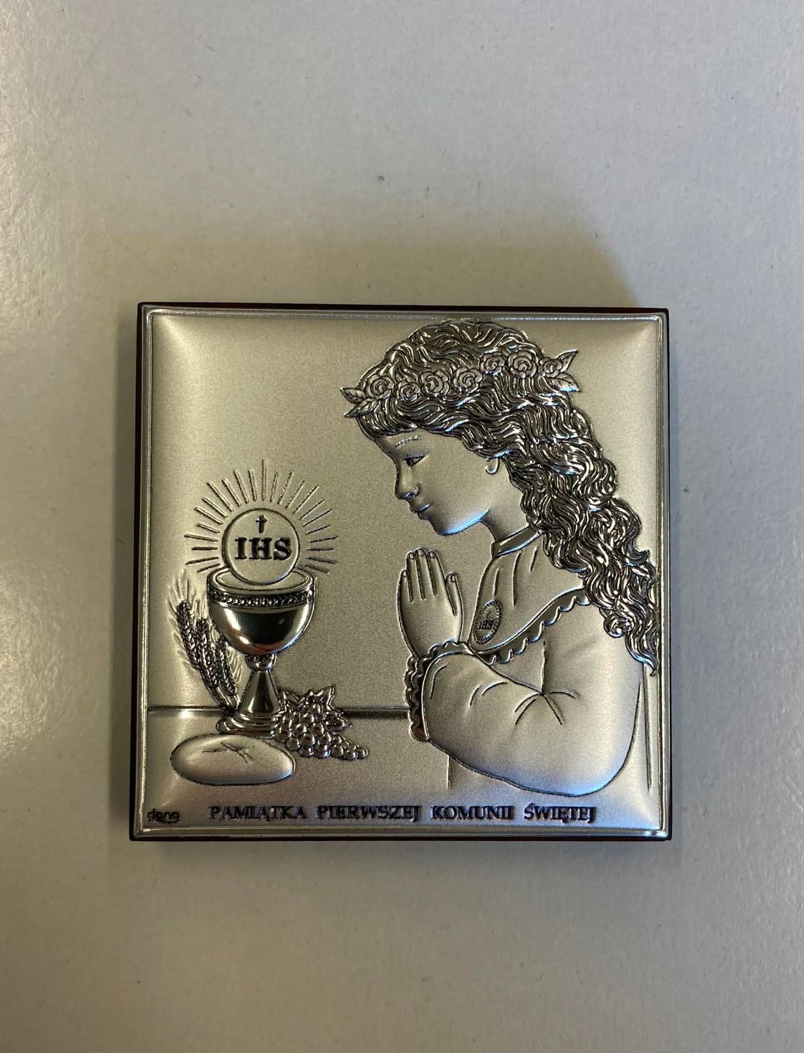 Pamiątka I Komunii Świętej dziewczynka
