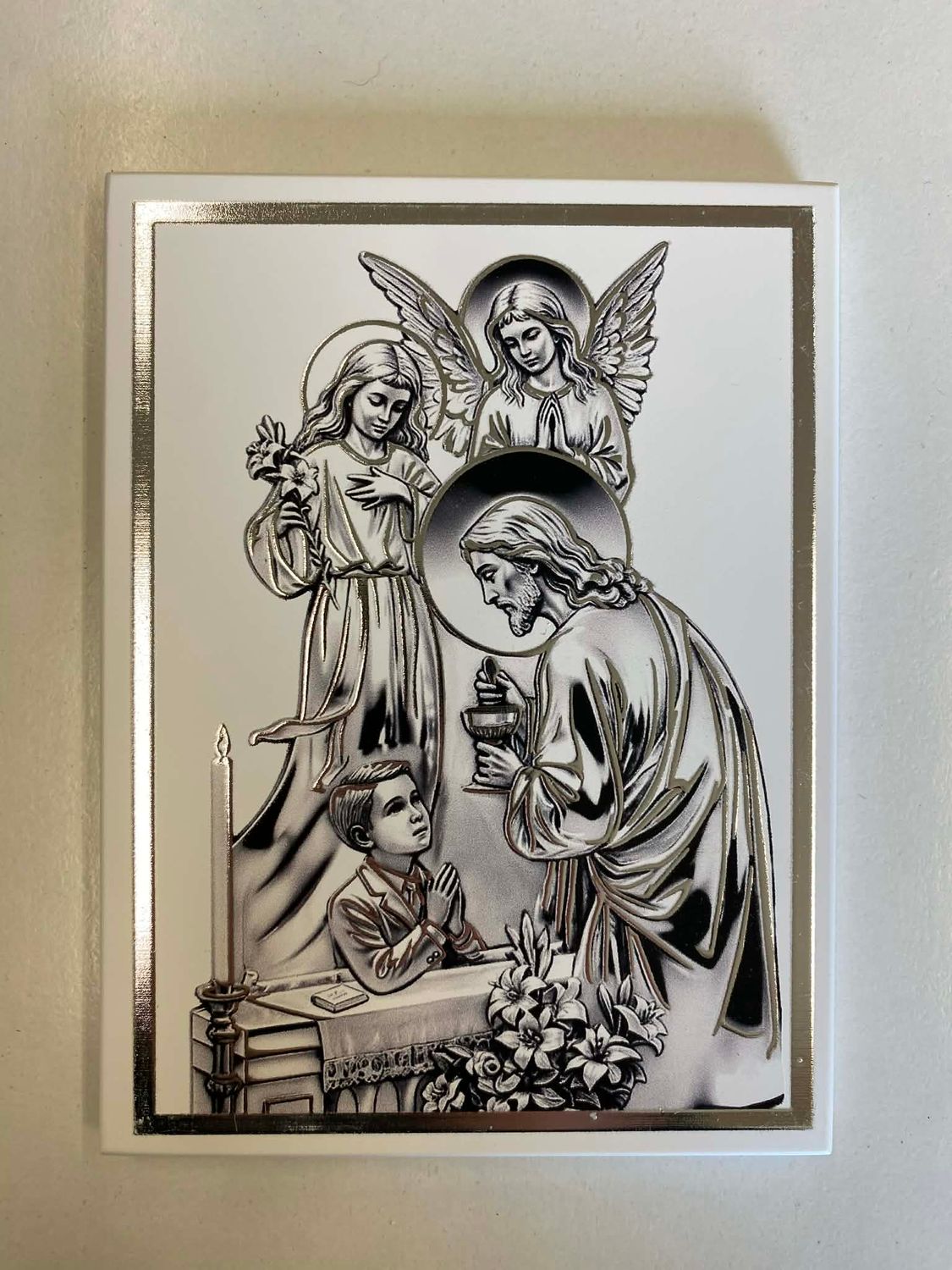 Pamiątka I Komunii Świętej chłopiec