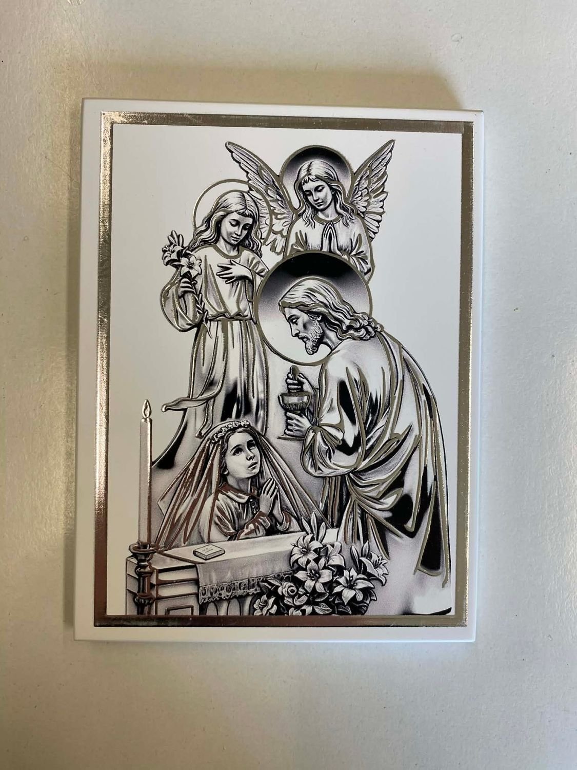 Pamiątka I Komunii Świętej dziewczynka