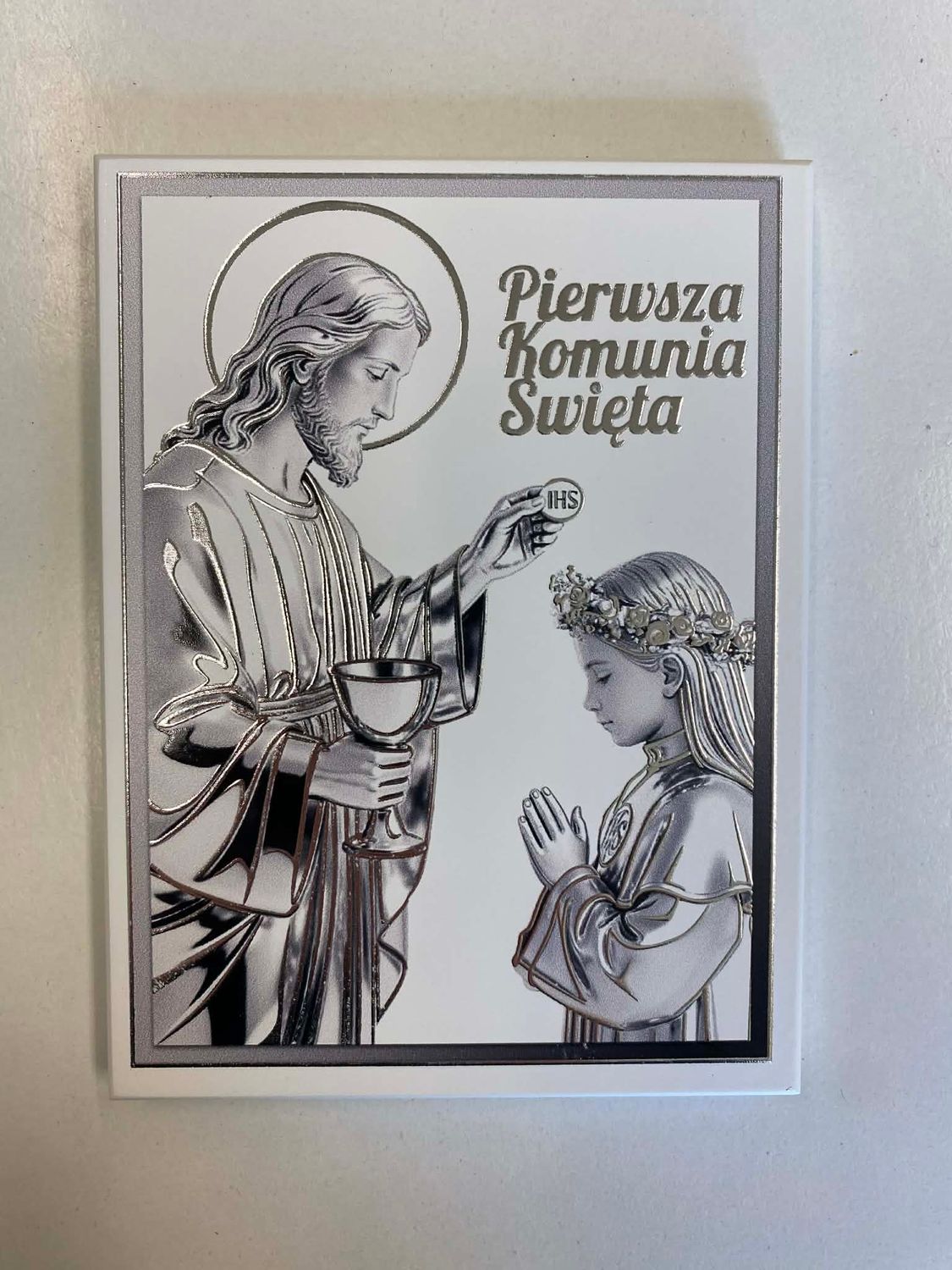 Pamiątka I Komunii Świętej dziewczynka