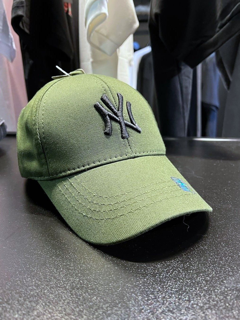 NY cap
