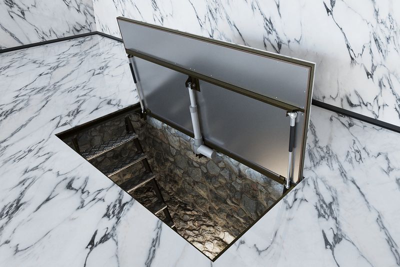 Interior floor hatches for tiles