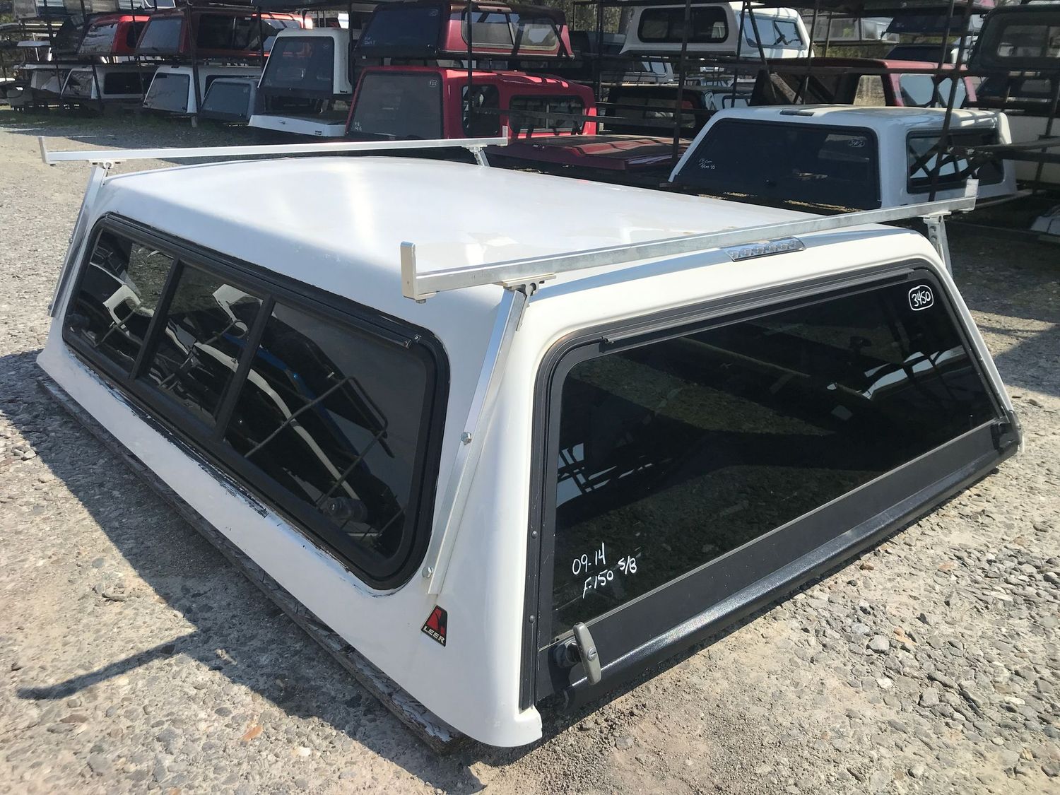 2009-2014 Ford F-150, 6.5' bed, Leer 100R (Used)