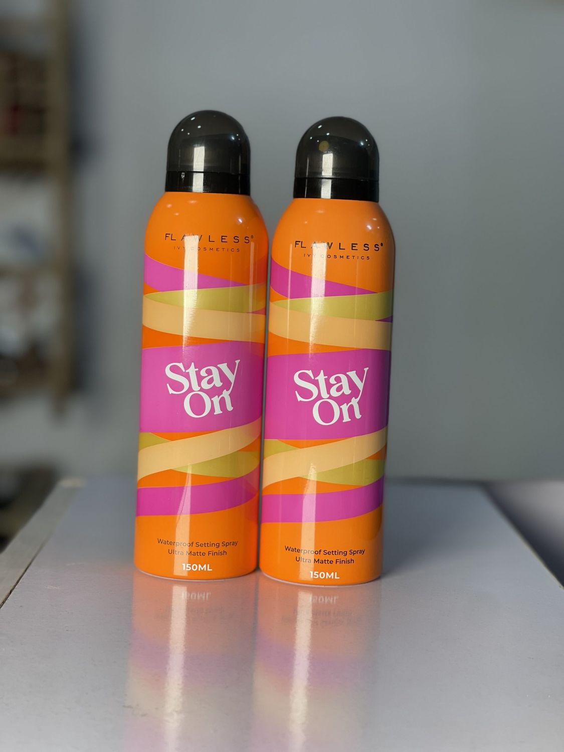 SPRAY STAY ON