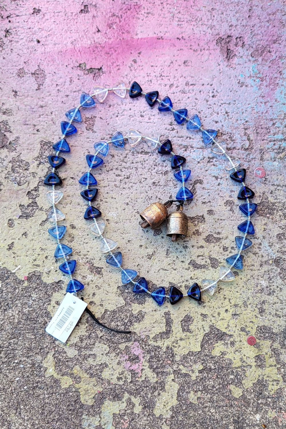 The Blue Waters Strand Of Beads And Bell