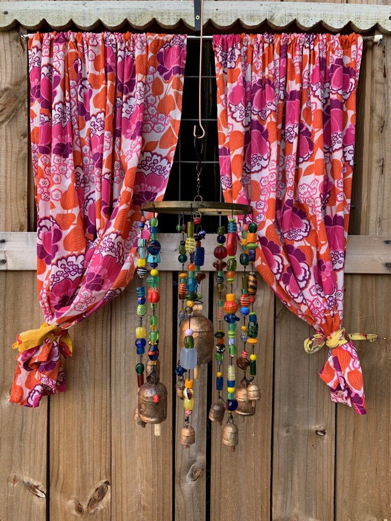 The Aura Of Glass Beads And Bells