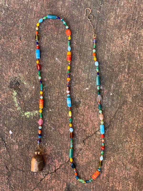 A Splash Of Colors Strand Of Beads With Bell