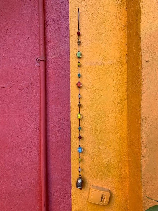 Mixed Marble Strand Of Beads And Bell