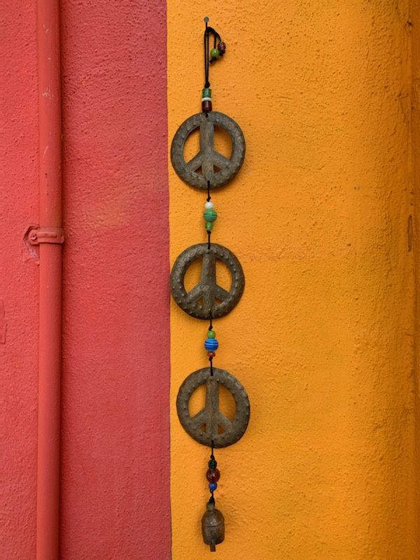 The Triple Peace Symbol with Beads and Bell