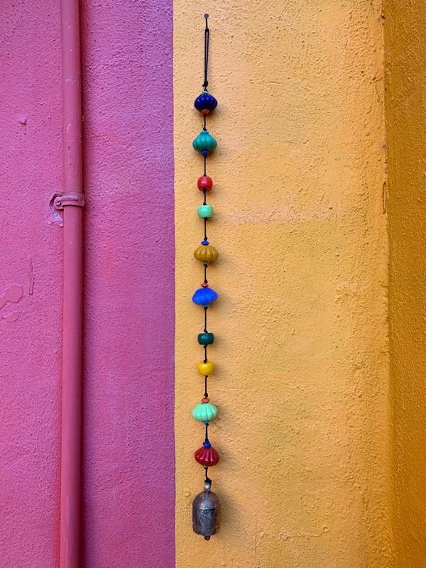 The Colors Bloom Strand Of Beads And Bell