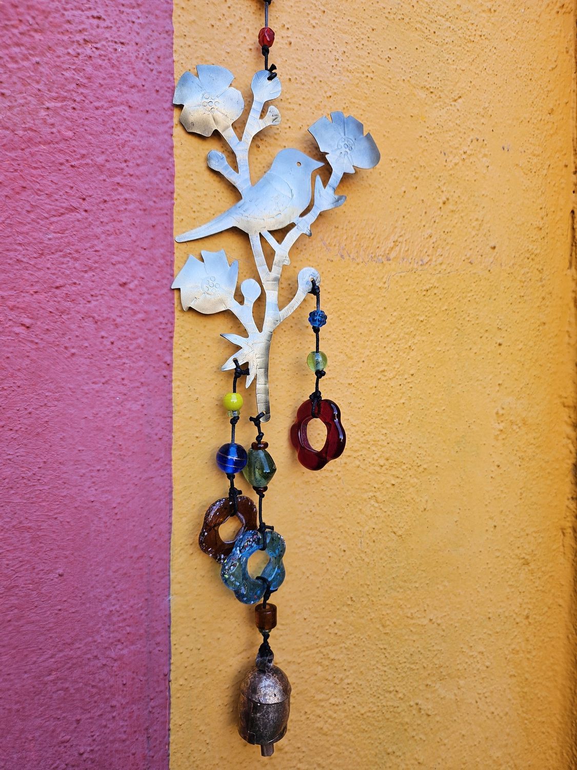 The Lone Bird On A Perch Beads And Bell