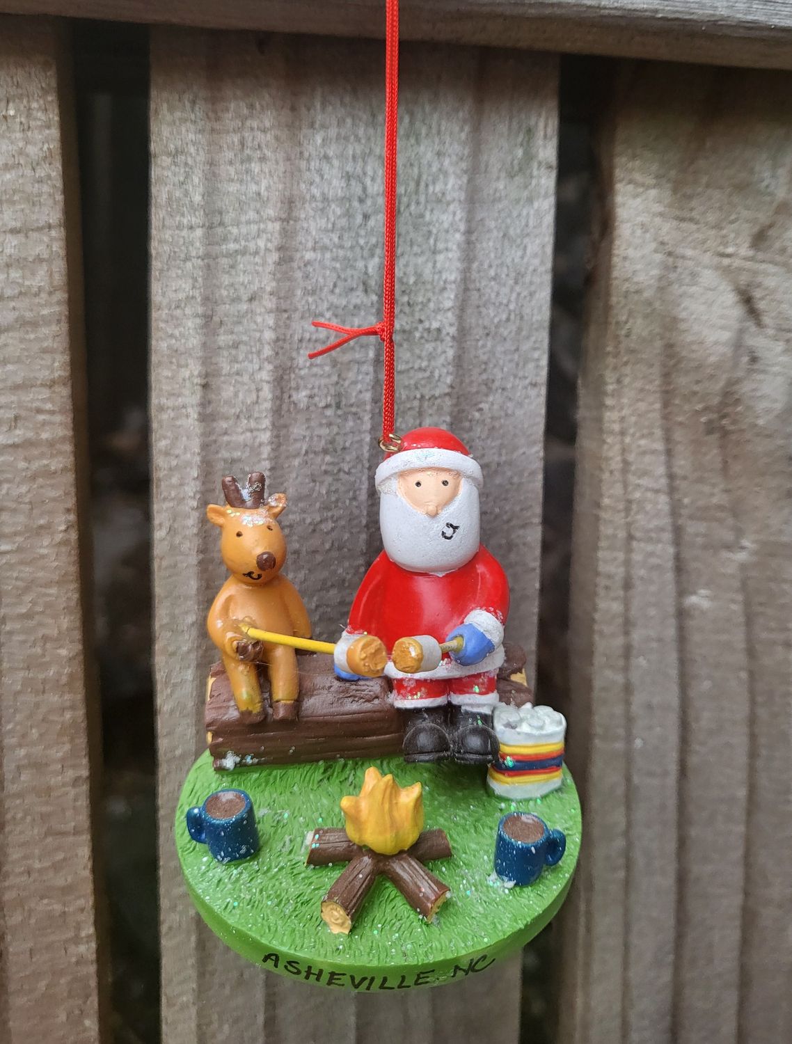 Santa And Reindeer By Fire Asheville Ornament
