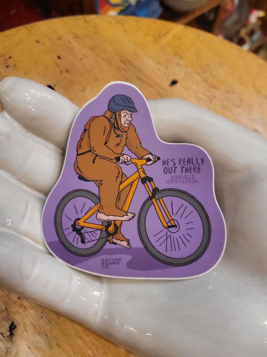 He’s Really Out There Bigfoot On Bike Sticker