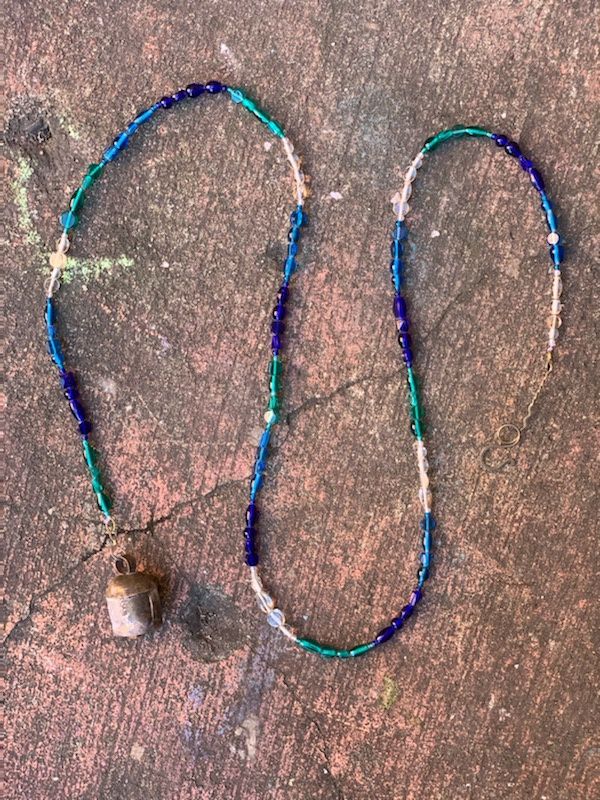 The Ocean Waters Strand Of Beads With Bell