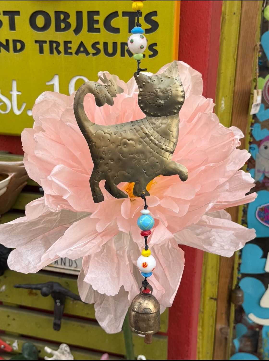 A Playful Cat Beads And Bell