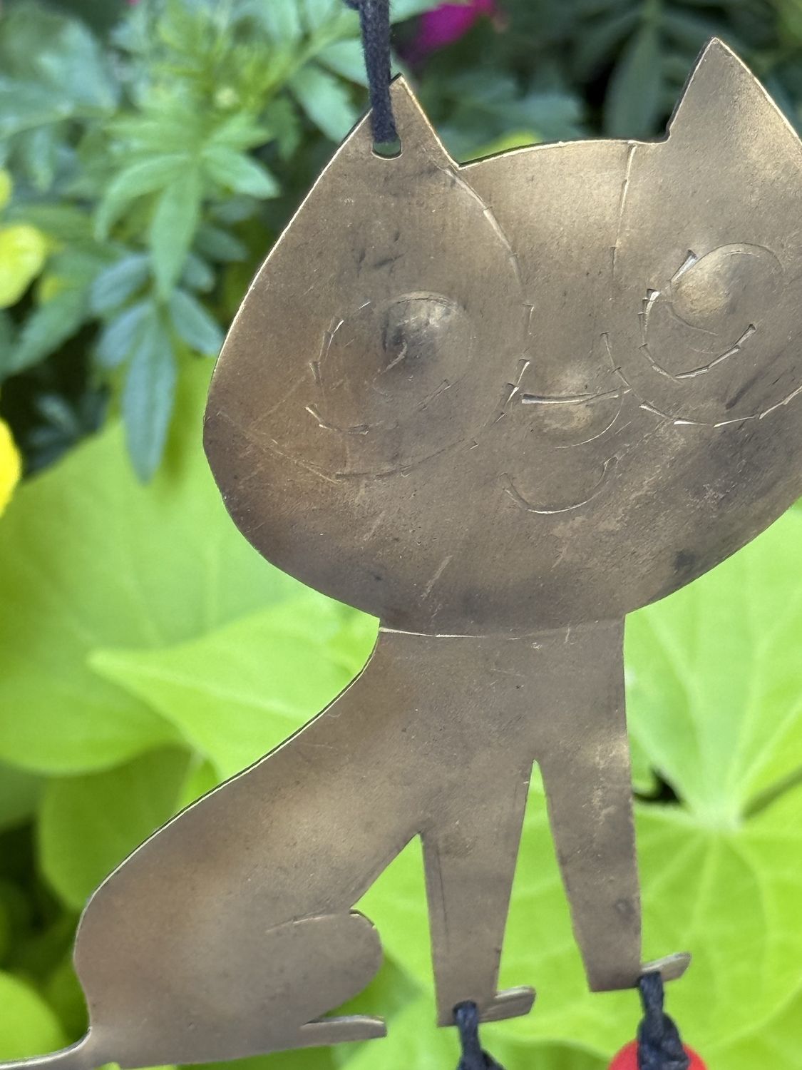 A Surprised Cat Beads And Bell