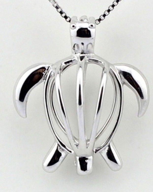 Sea Turtle - Sterling silver cage pendant