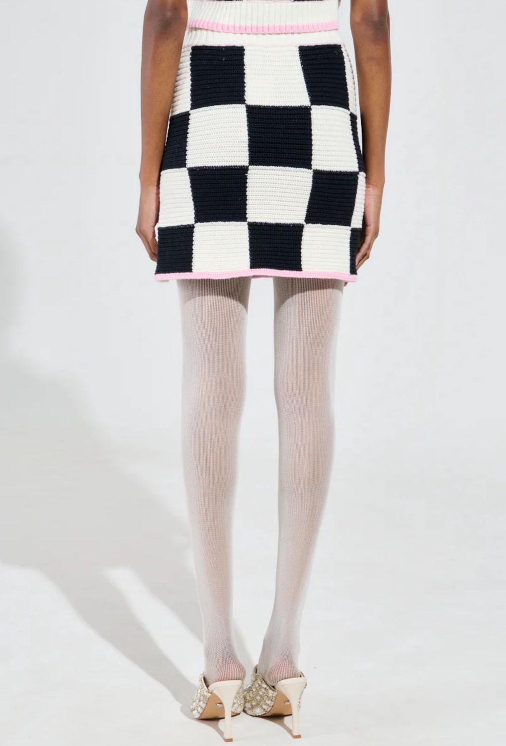 AHIGH SPIRITS SWEATER KNIT MINI SKIRT