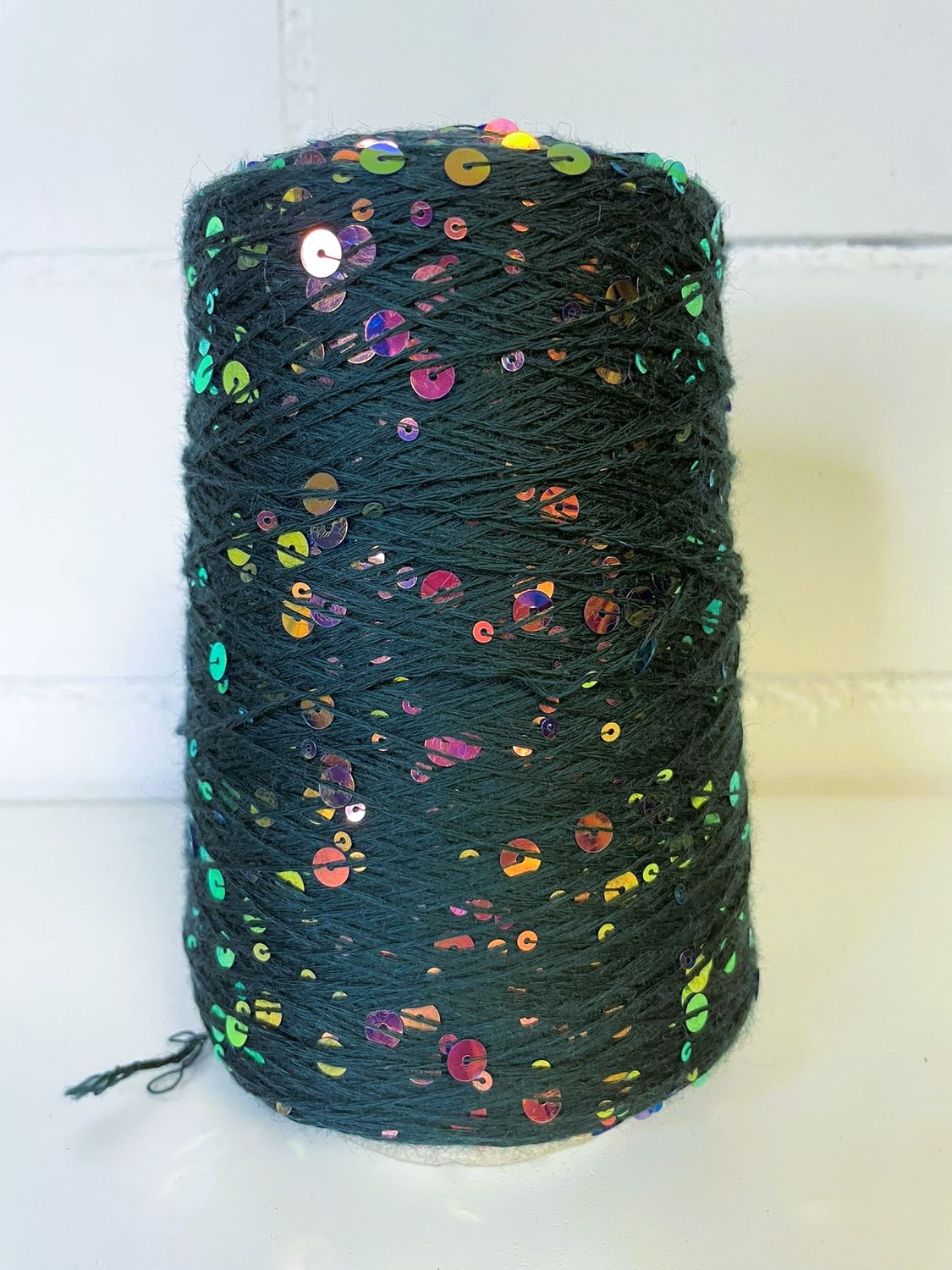 G&amp;G FILATI COSMO 360m/100 gr, 100% merino wool +6mm/3mm sequins dark green with colorful sequins