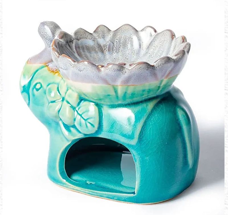 BRUCIATORE PER ESSENZE ELEFANTE BLU BRUCIATORE PER ESSENZE ELEFANTE BLU