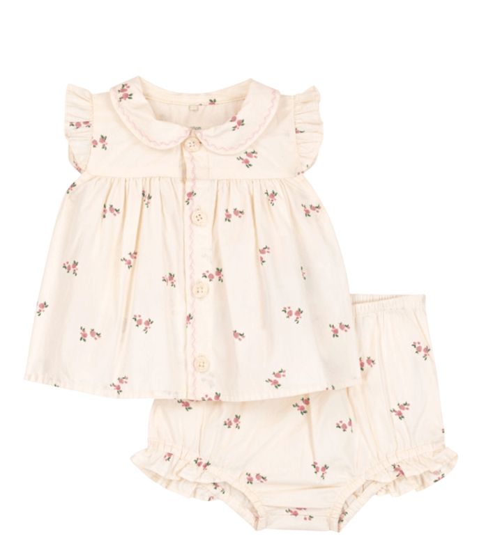 Petit Bateau Tweedelig katoenen babysetje met een bloesje en pofbroekje met bloemenprint
