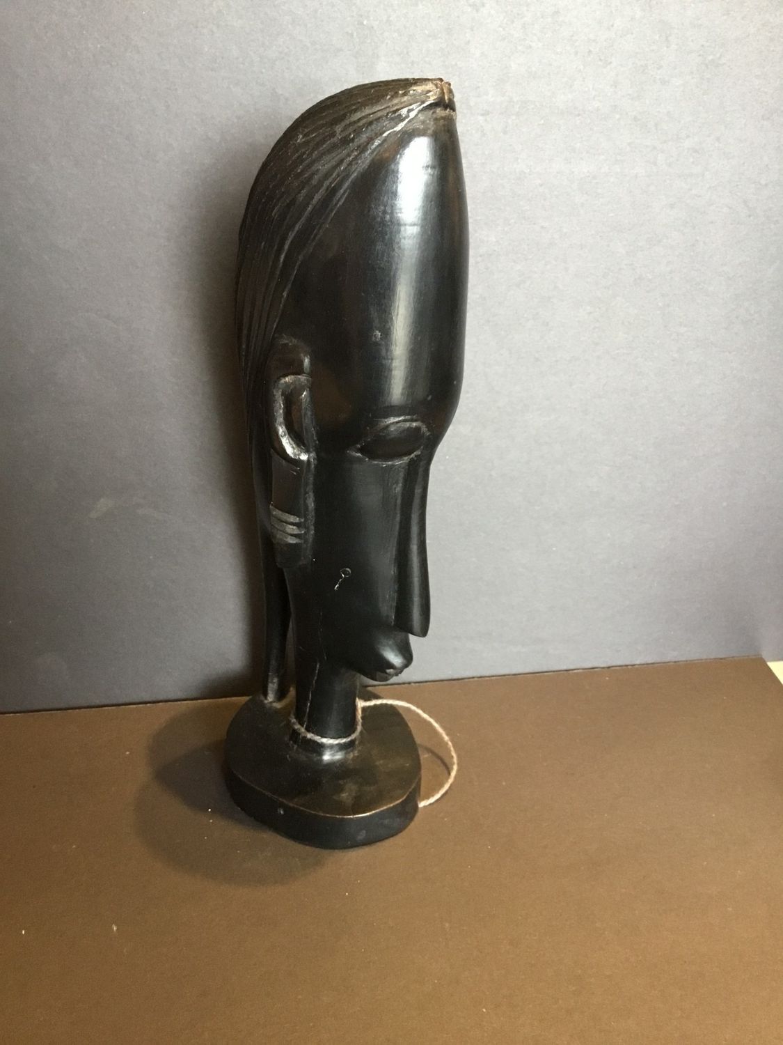 Long thin head African carving