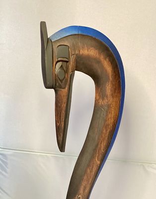 Indigenous Carving of a Crane on a Salmon