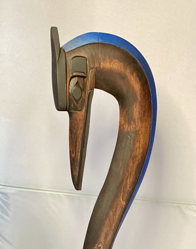 Indigenous Carving of a Crane on a Salmon