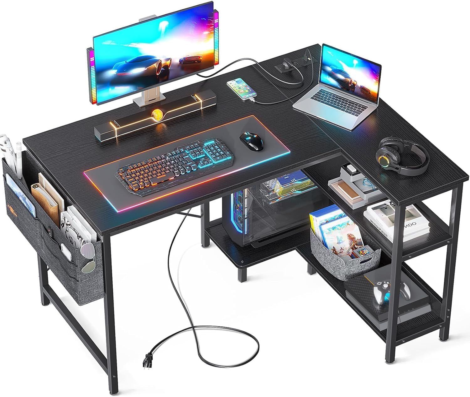 40 Inch Small L Shaped Gaming Computer Desk with Power Outlets, Reversible Storage Shelves &amp; PC Stand for Home Office, Simple Writing Study Table with Storage Bag for Small Space, Black