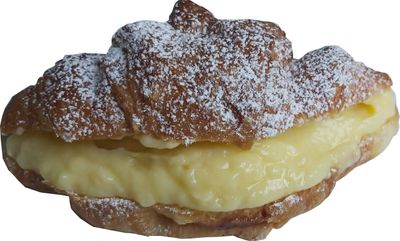 A LARGE CROISSANT FILLED WITH PASTRY CREAM