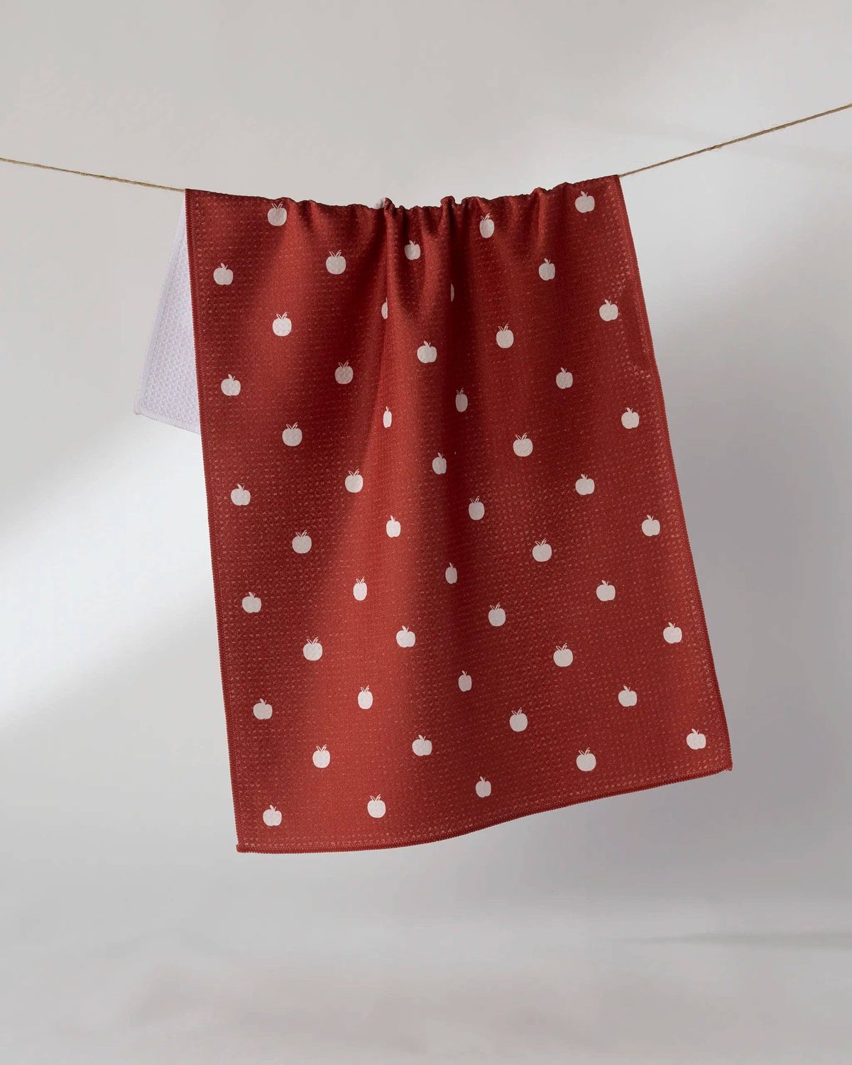 Dotty Apple Tea Towel, Color: Clay Red