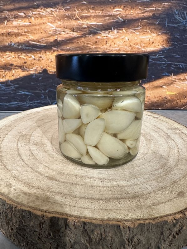 Geblancheerde knoflooktenen in olie 200g