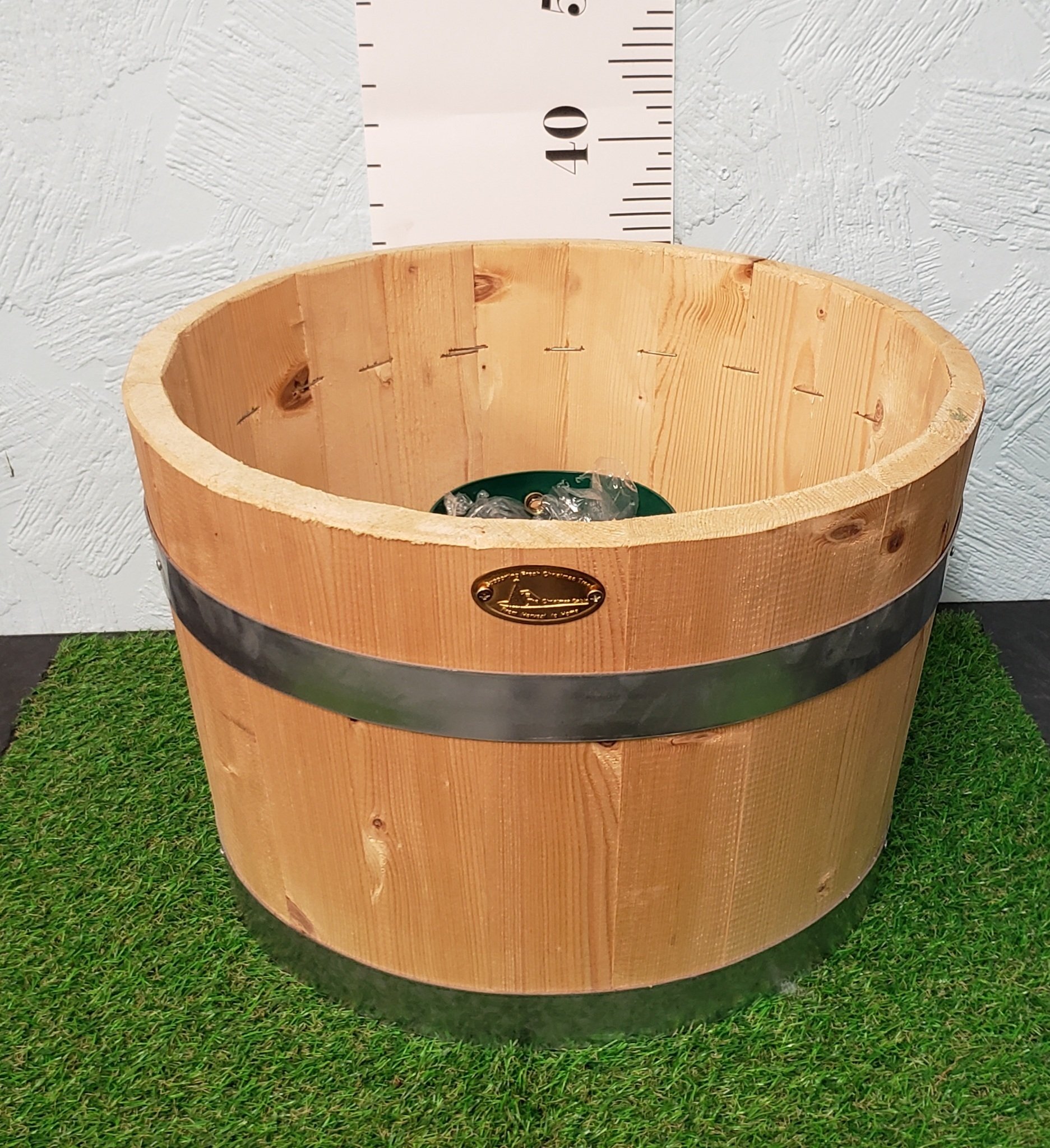 Natural wooden barrel tree stand