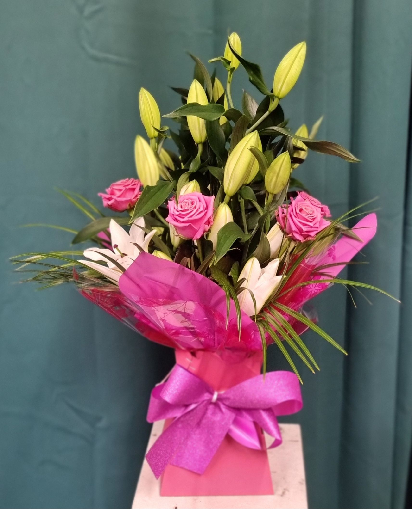 Aqua packed Lily and rose Bouquet for Local delivery  starting from £60.00