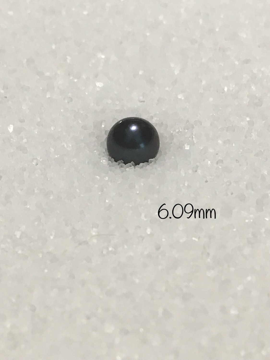 6.09