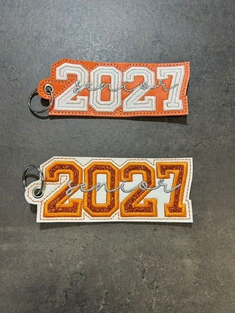2027 Senior Keychain Celina, Design: White background Orange 2027