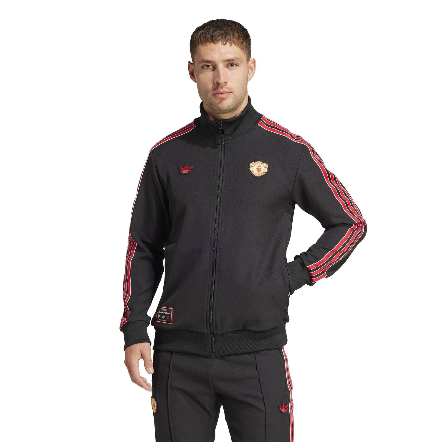 MANCHESTER UNITED 24/25 TERRACE ICONS TRACK TOP (BLACK/RED)