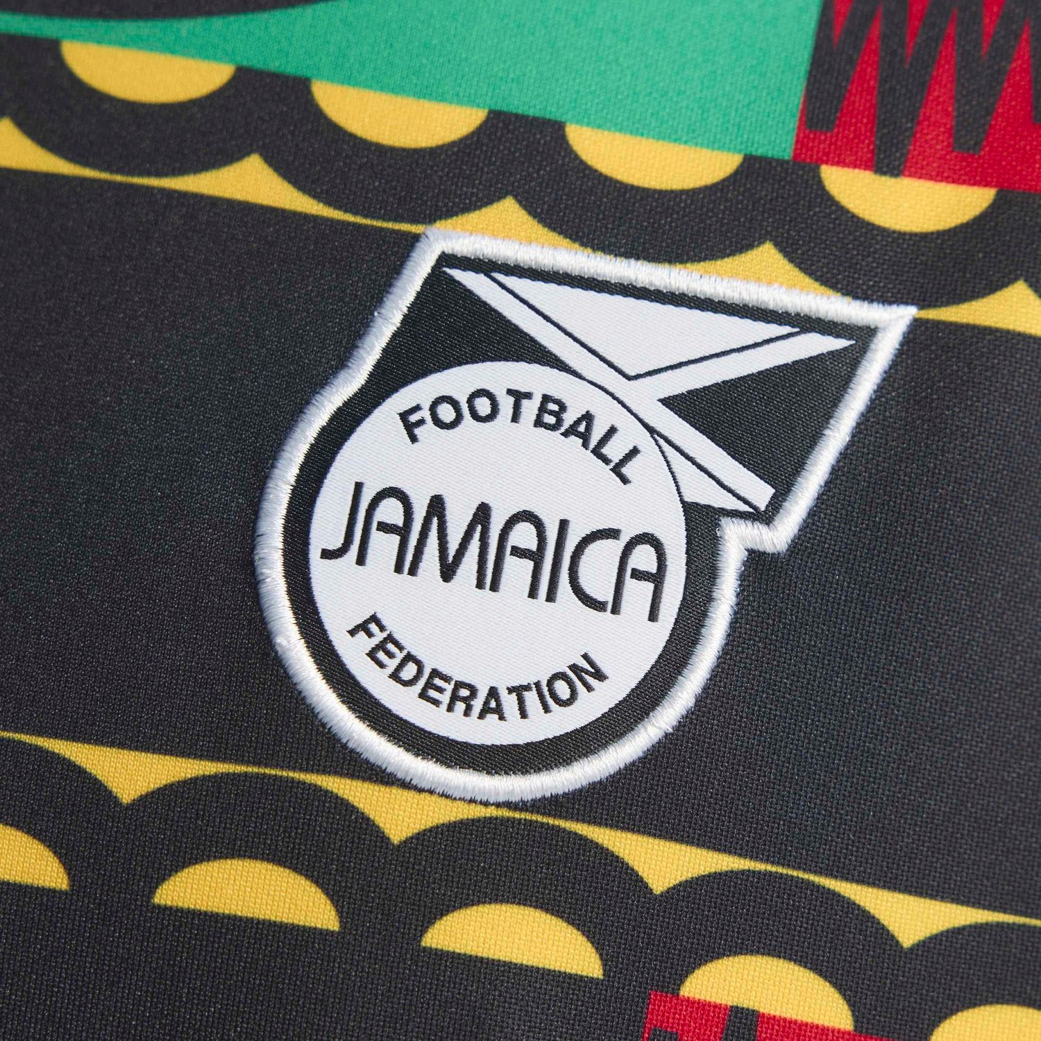 JAMAICA  X BOB MARLEY 2026 ORIGINALS TEE (BLACK/MULTI)