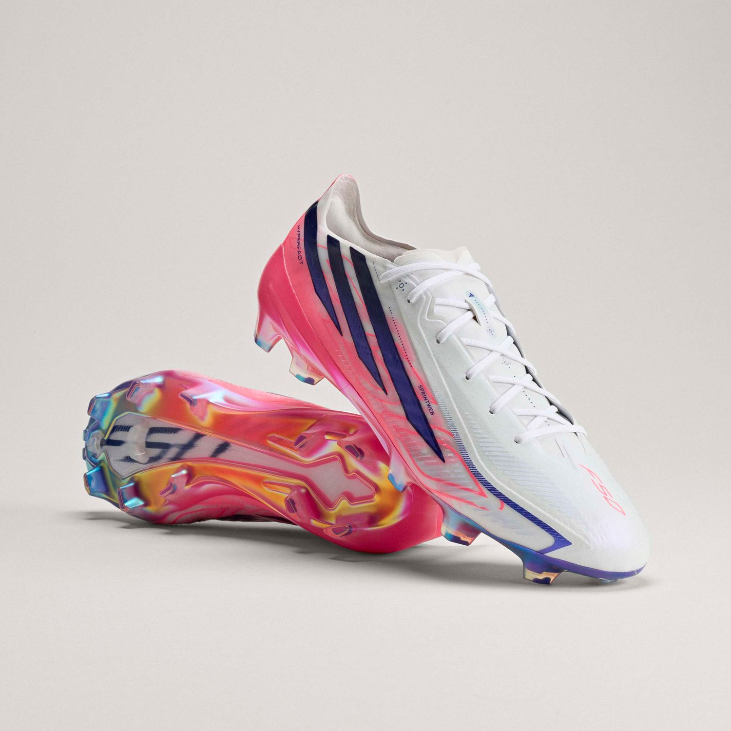 F50 HYPERFAST ELITE FG (WHITE/PURPLE/ SOLAR TURBO)